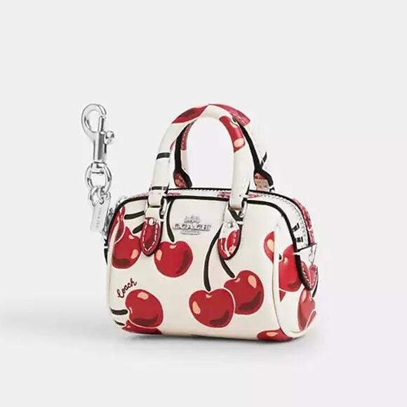 Coach CZ082 Mini Rowan Bag Charm With Cherry Print In Silver/Chalk Multi - Picture 1 of 6